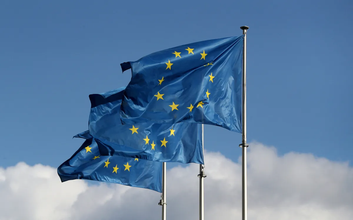 European Union flags outside an EU institution building